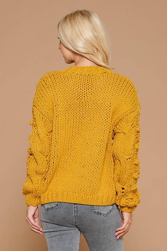 Twisted Knit Sweater With Pompom Detail