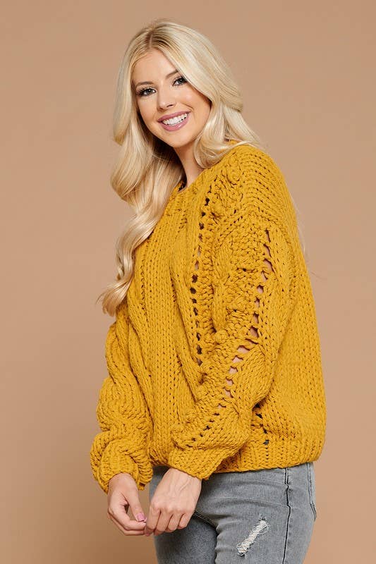 Twisted Knit Sweater With Pompom Detail